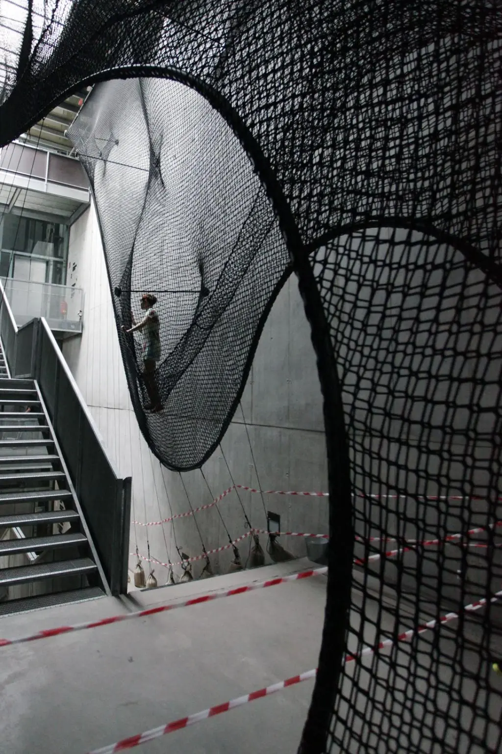 Net Linz hangs in the stairwell of the OK Center