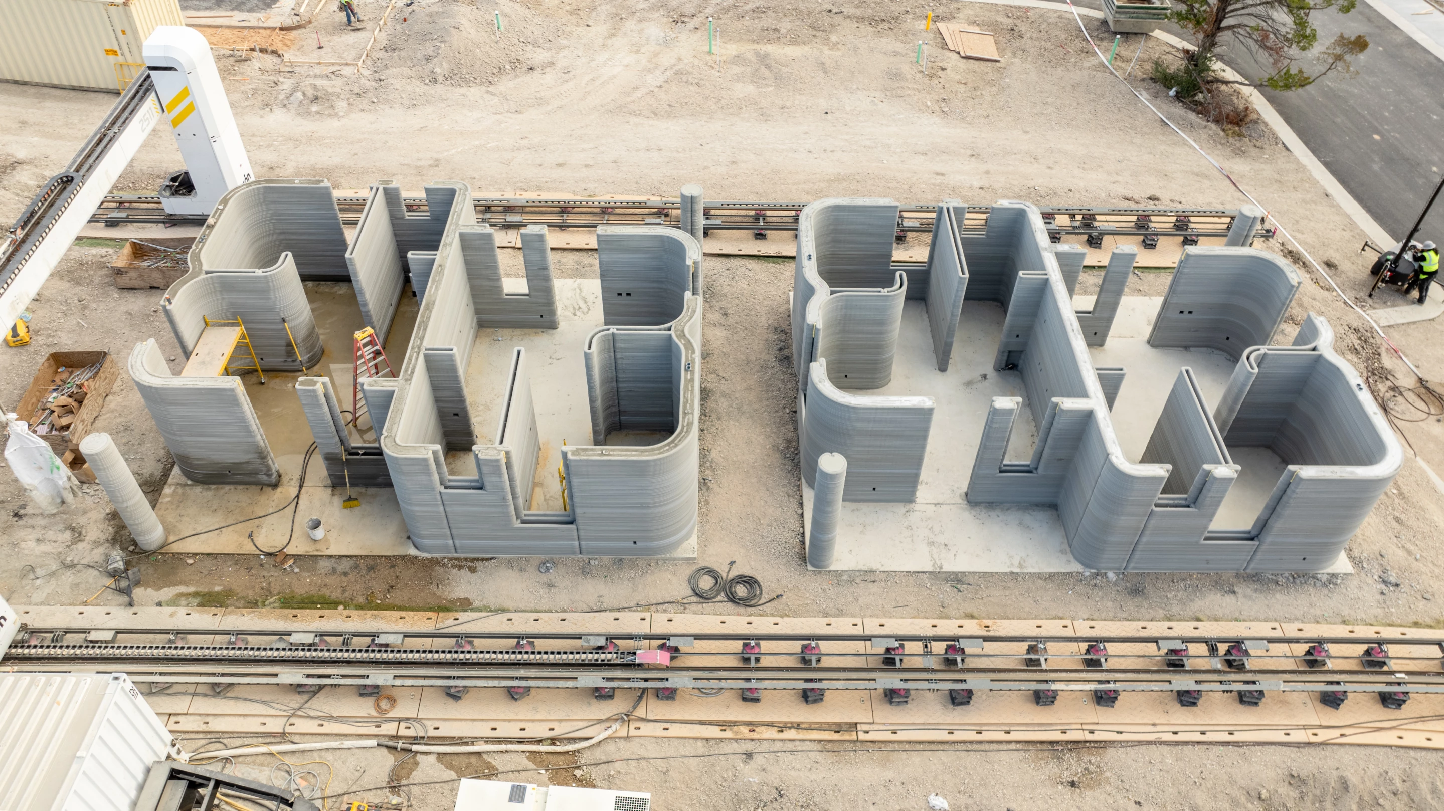 Once Icon's Vulcan 3D printer has finished printing the shell of the homes, human builders then finish the roof, doors, and anything else required