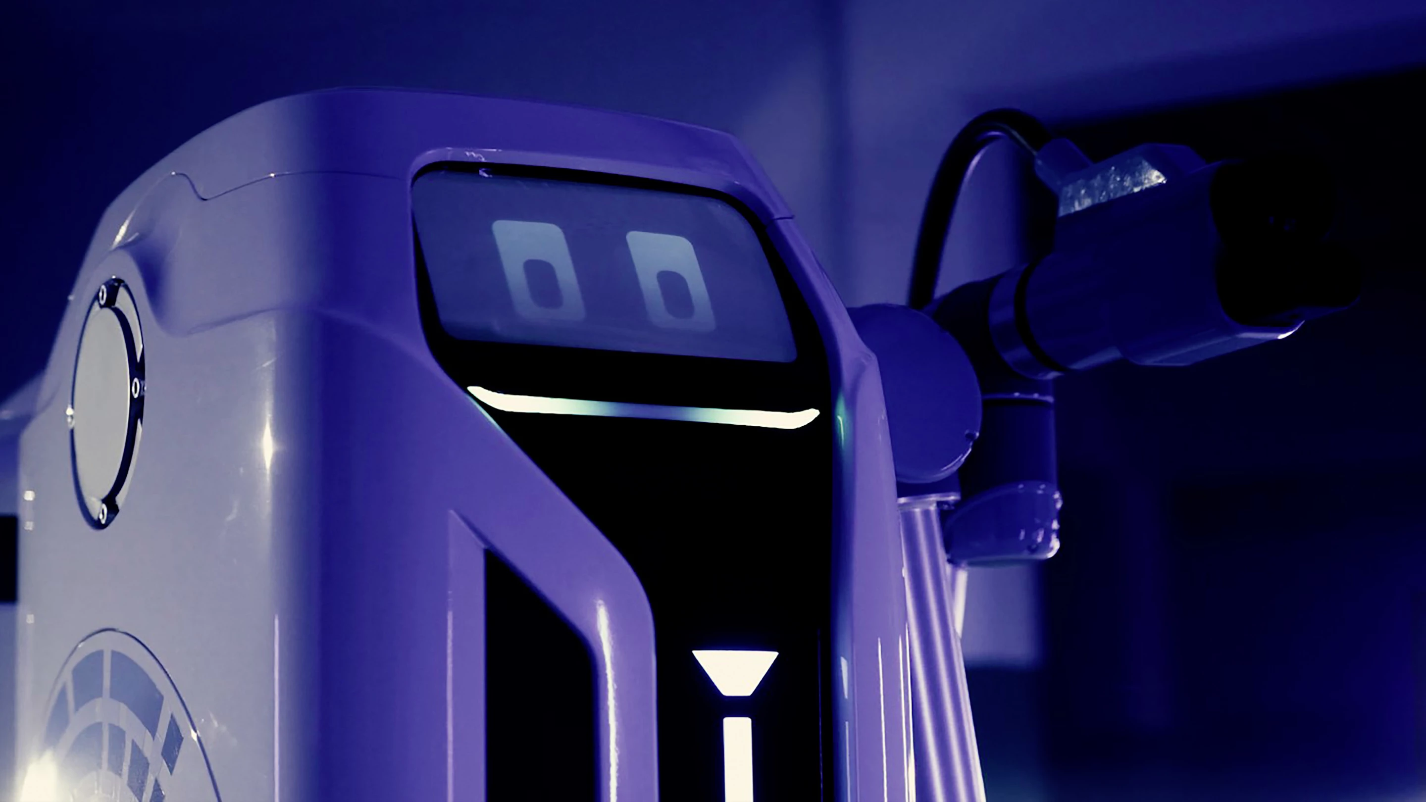 The mobile charging robot prototype with plug at the ready