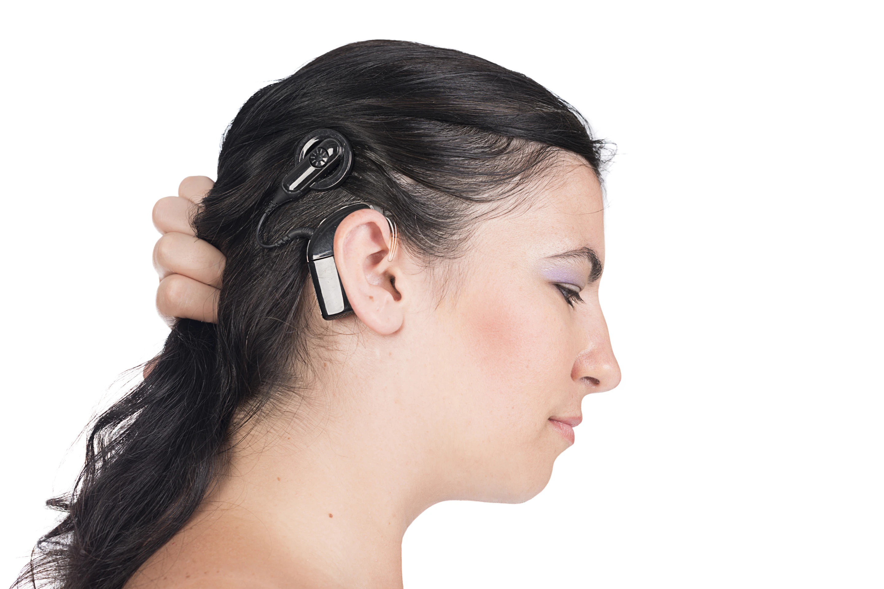 The hard-to-miss external components of a traditional cochlear implant (Photo: Shutterstock)