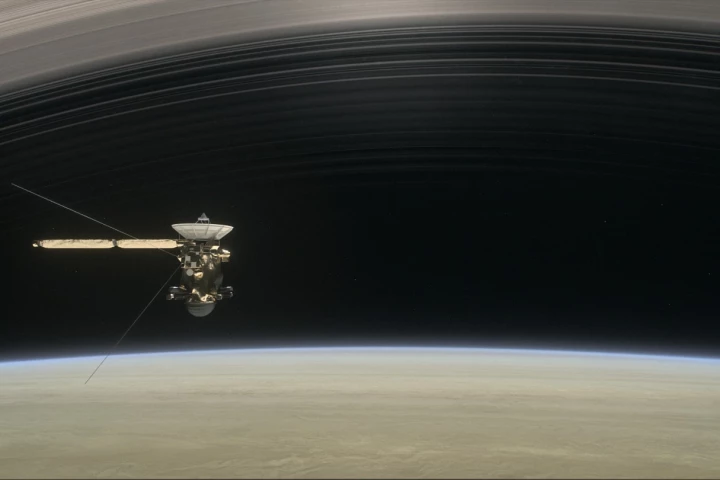 Artist's rendering of Cassini, as the spacecraft making one of its final five dives through Saturn's upper atmosphere