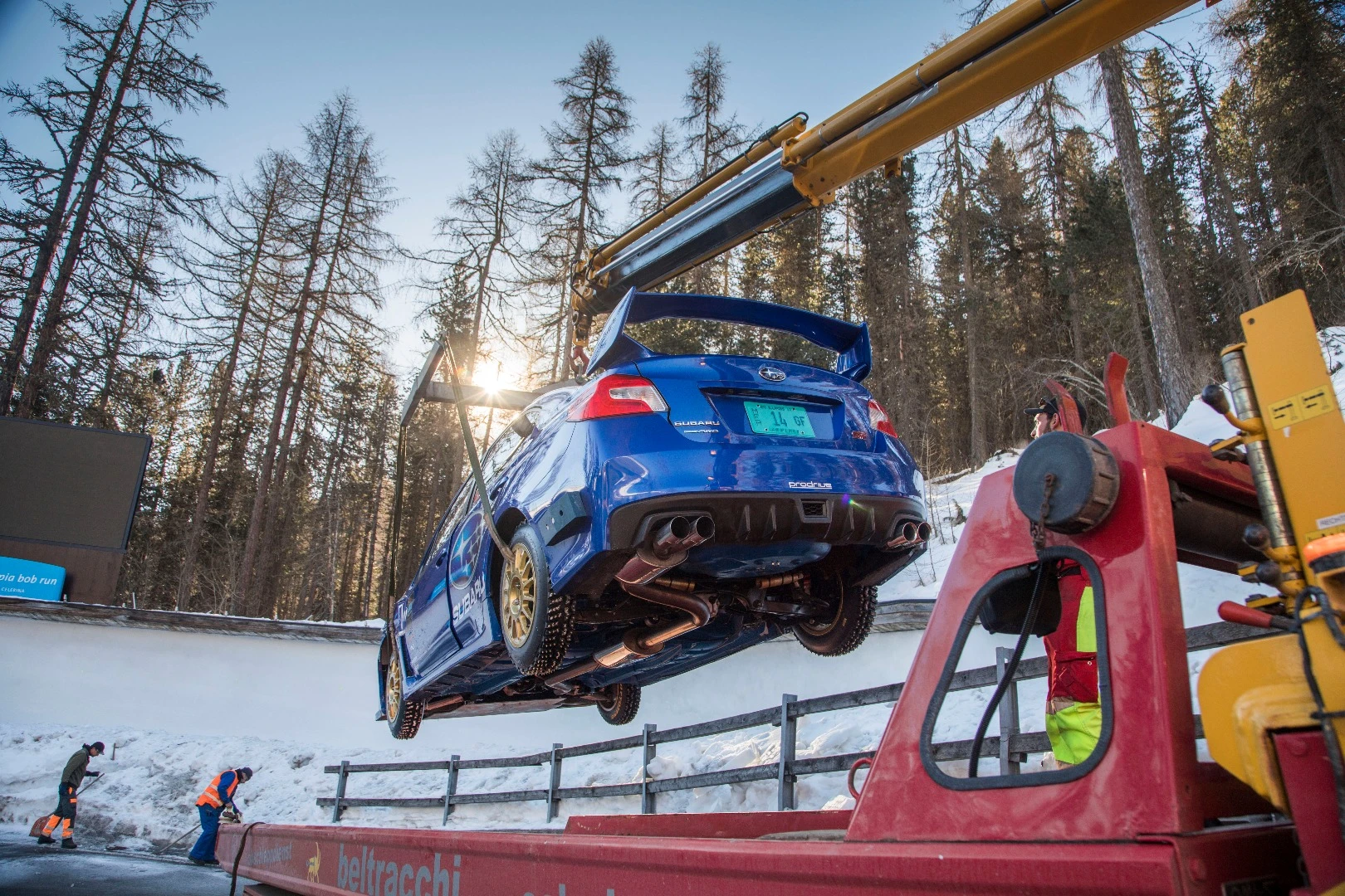 The STI had to be craned into the bobsled run