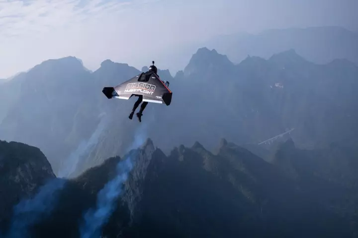 Vince Reffet took this photo of his long-time partner in crime Fred Fugen as the pair flew their Jetman jet wings over the mountains of China