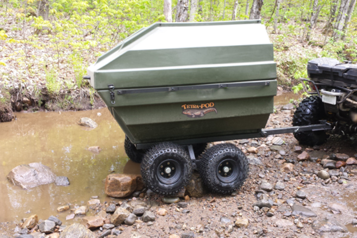 Tetra-POD clamshell trailer pops open into a boat