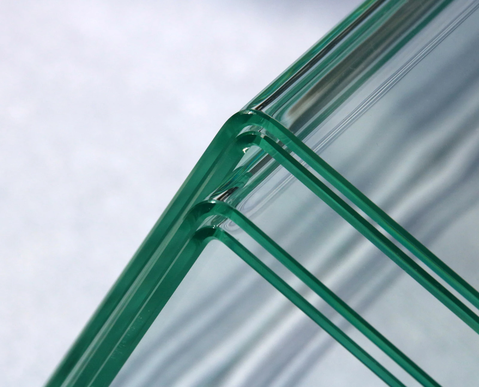 The process was used to bend these 3 mm-thick sheets of laminated safety glass