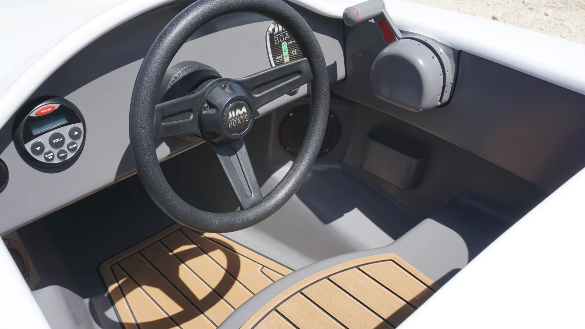 The JimBoat is 6.5 ft long, weighs 75 kg (165 lb), and with an electric motor providing 55 lb of thrust via an enclosed 3 blade propeller, it's capable of 5.5 knots