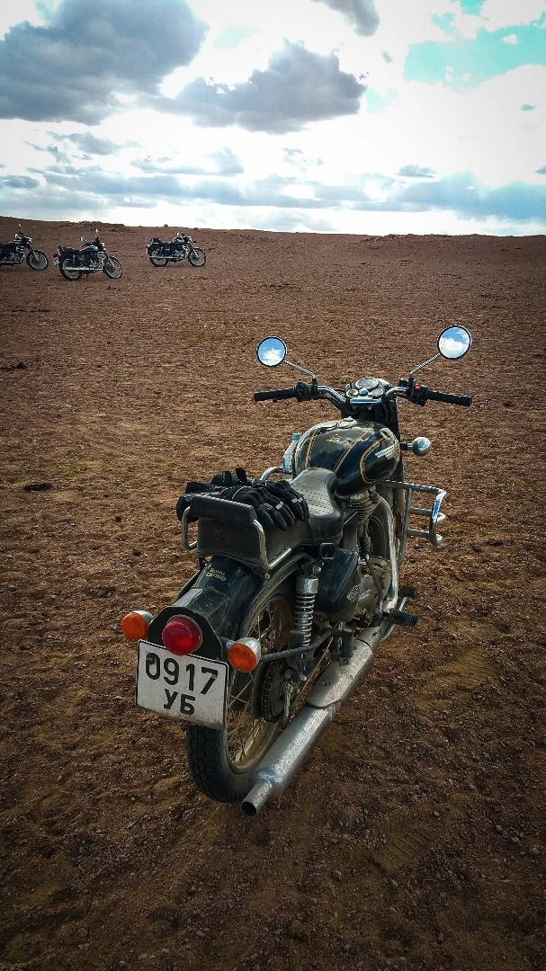 Royal Enfield Bullets in the desert between Bayanbuli and Myangad