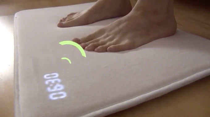 Ruggie is made from rebounding memory foam and felt with a touch sensor and bright LED display in the corner