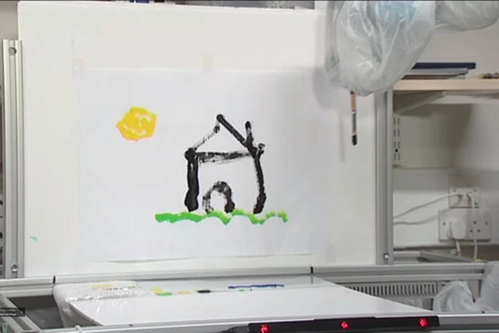 The work of art created by a robotic arm controlled entirely by a person's eye movement