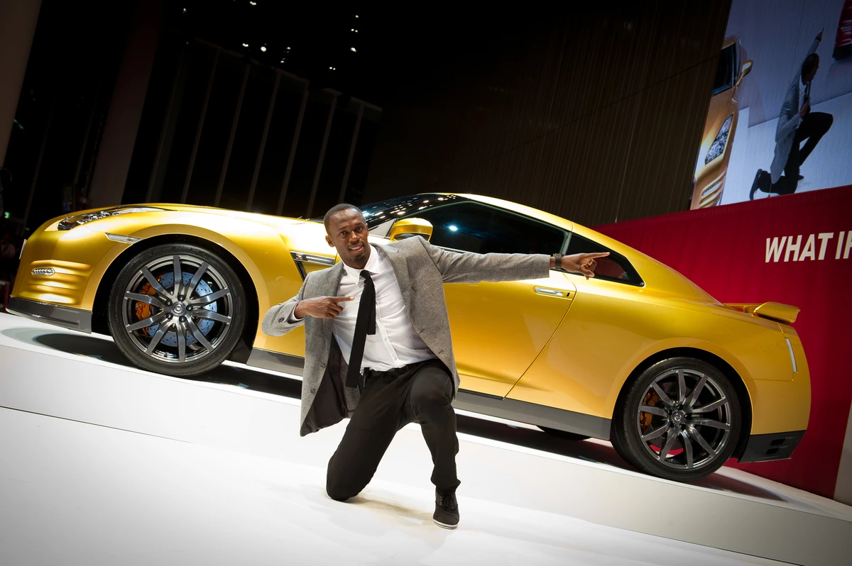 Usain Bolt with the custom Bolt Gold GT-R