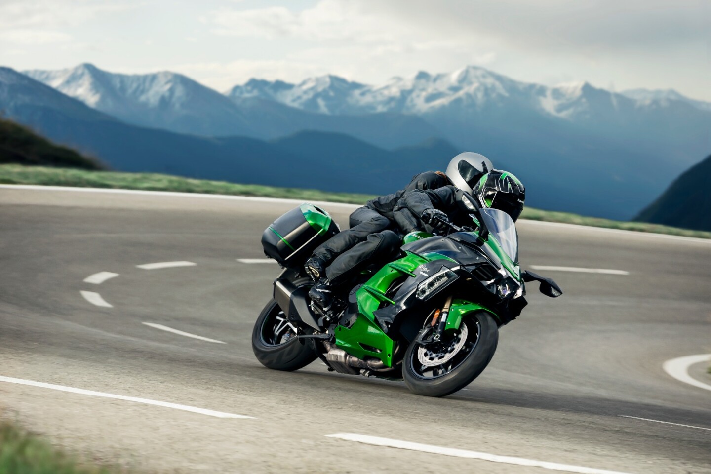 The 2018 Kawasaki H2 SX in two-up cornering action