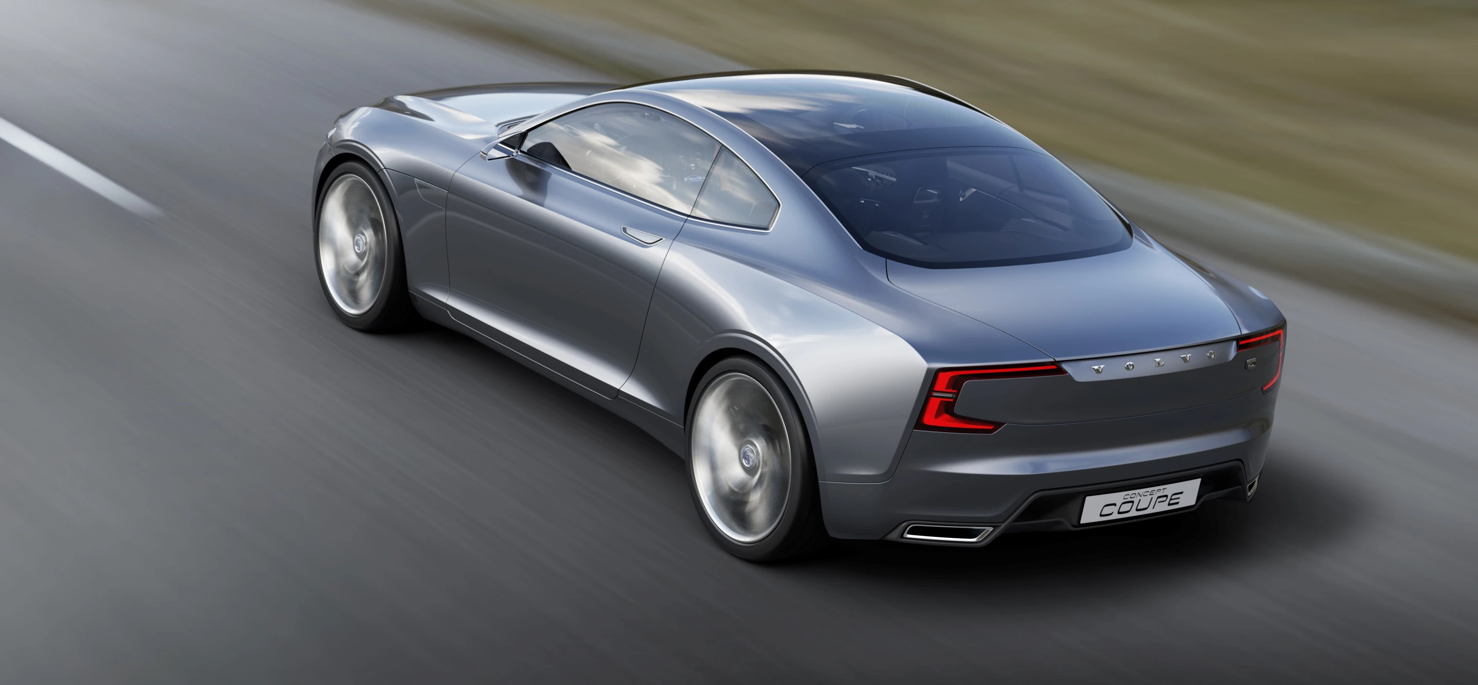C-shaped tail lights mark the broad-shouldered rear end of the Concept Coupe