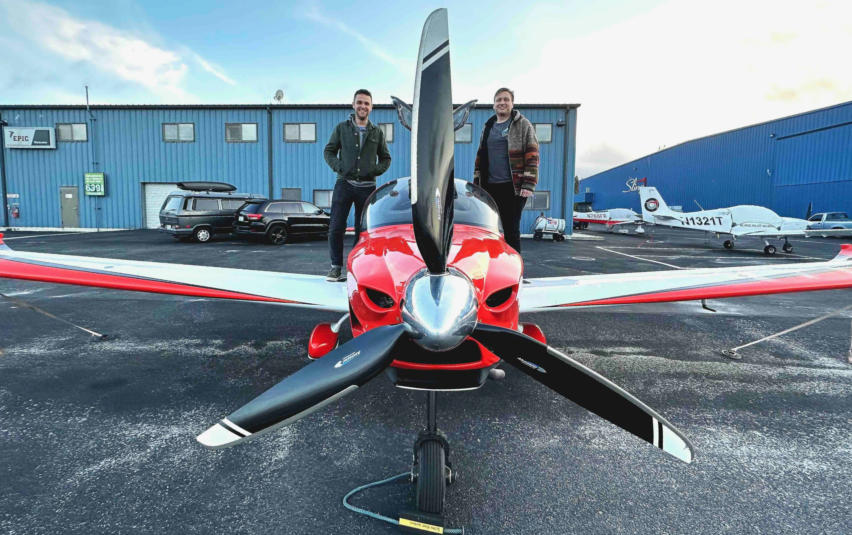 Airhart Aeronautics lead flight software engineer Soren Rademacher (left) and CEO/co-founder Nikita Ermoshkin (right) with the Airhart Sling prototype