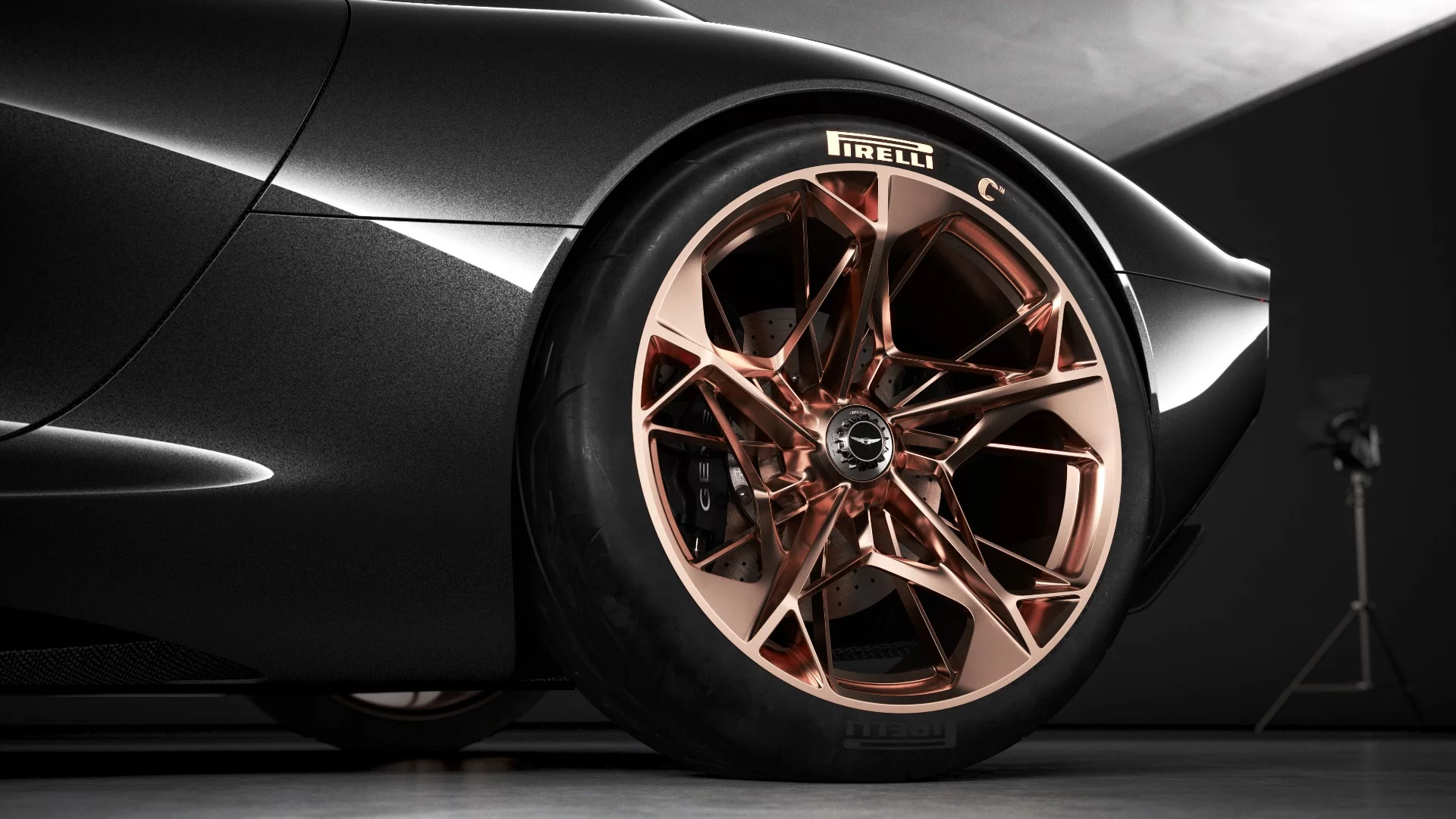 The copper-color wheels stand out against the Stardust Gray Metallic paint