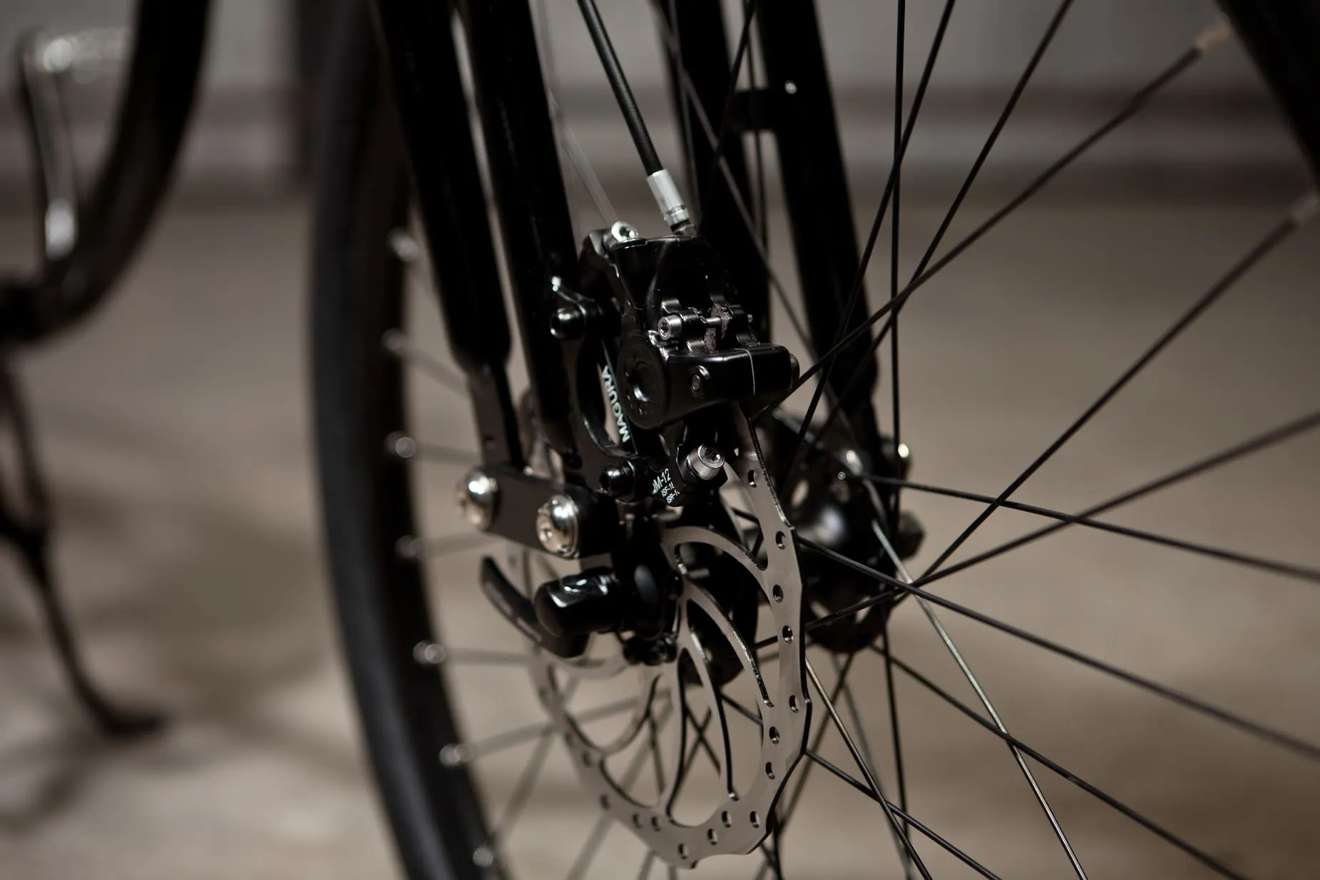 The e-bike's top speeds vary from 20 mph in the base model to 40 mph in the Bespoke series, and mileage ranges from 22 to 38 miles