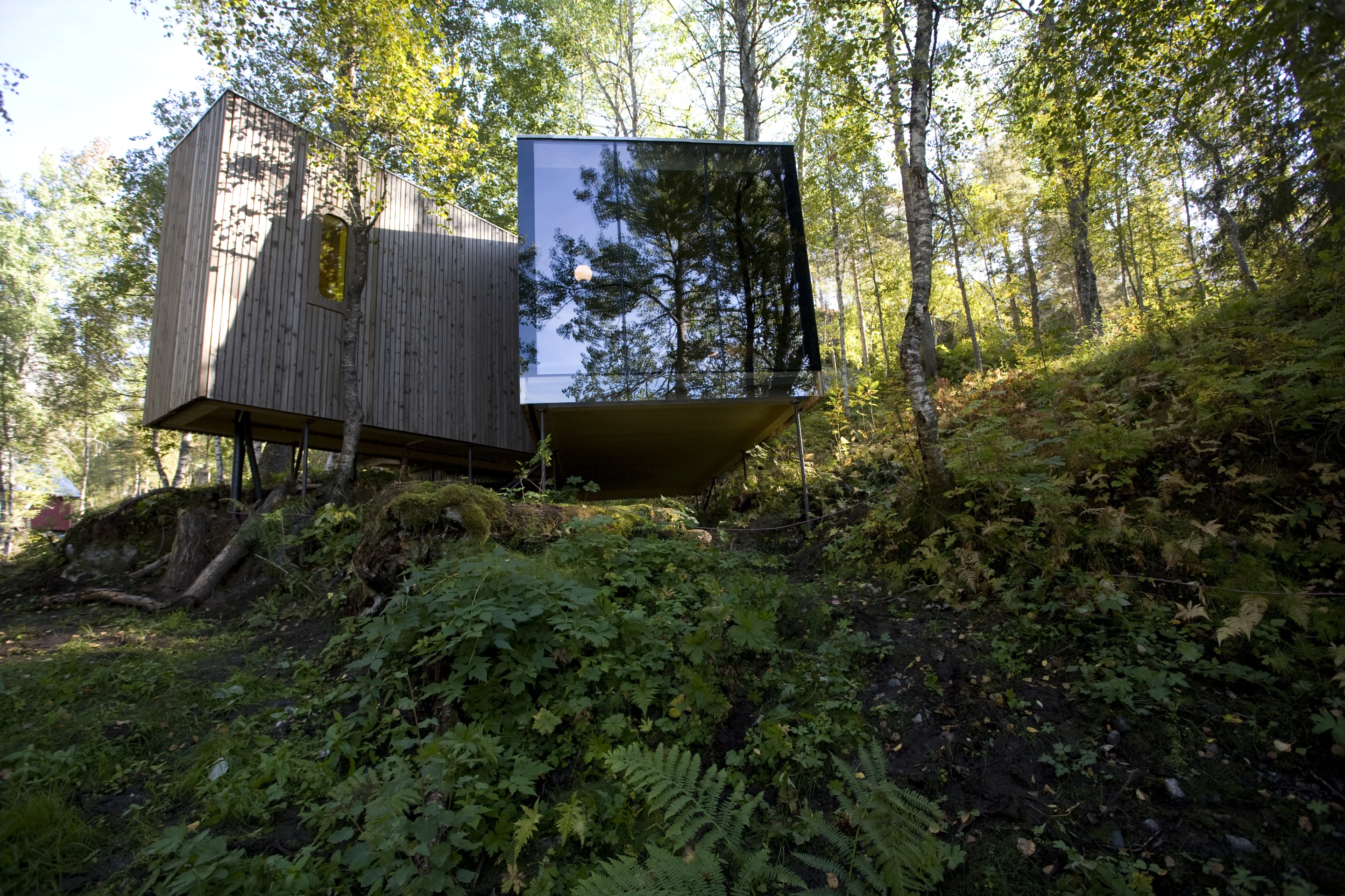 Located outside the small town of Gudbrandsjuvet, Norway, Juvet is positioned amid its main attraction - the pristine forest