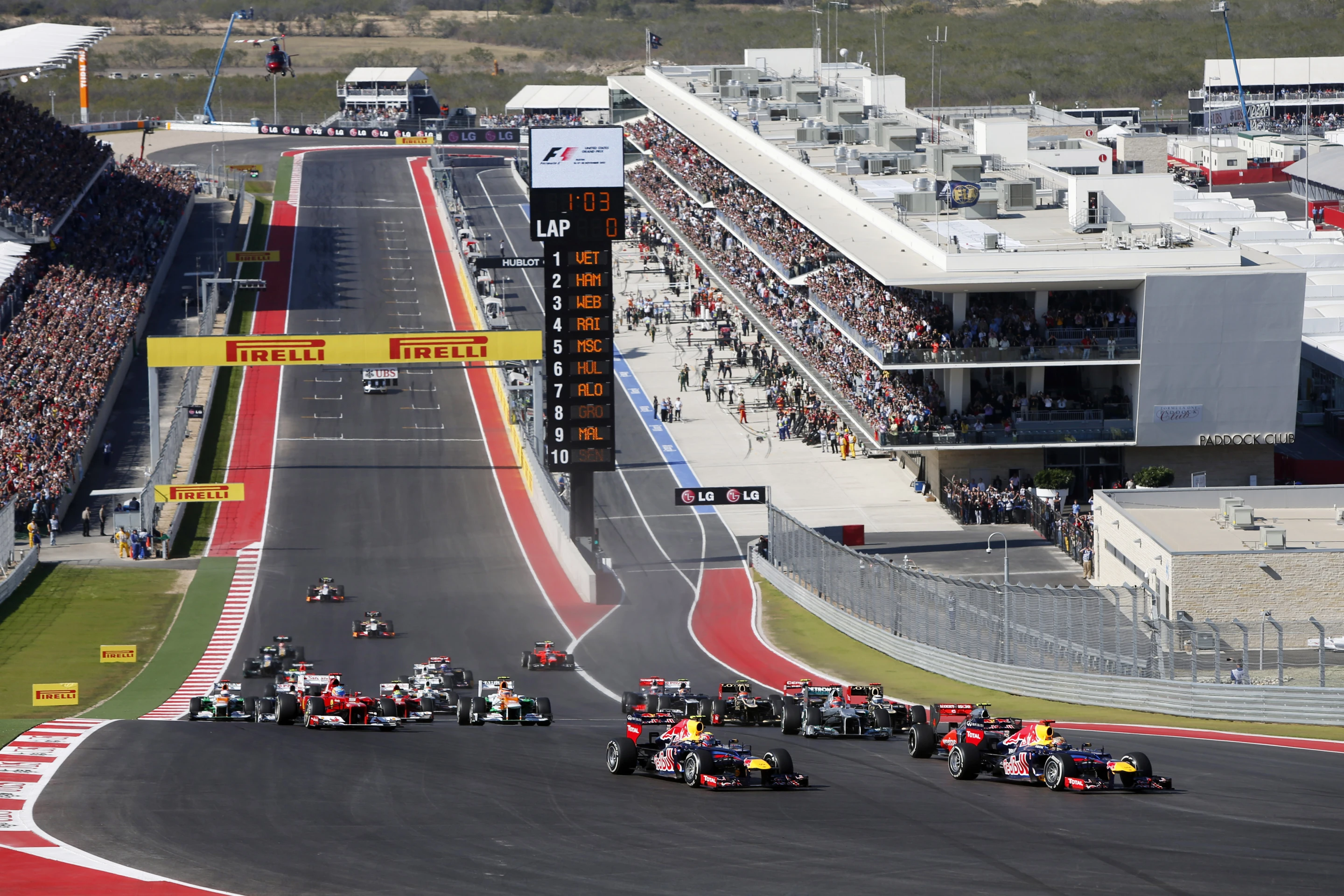 The F1 cars round corner number 1 at COTA up a steep incline (Photo: Circuit of the Americas)