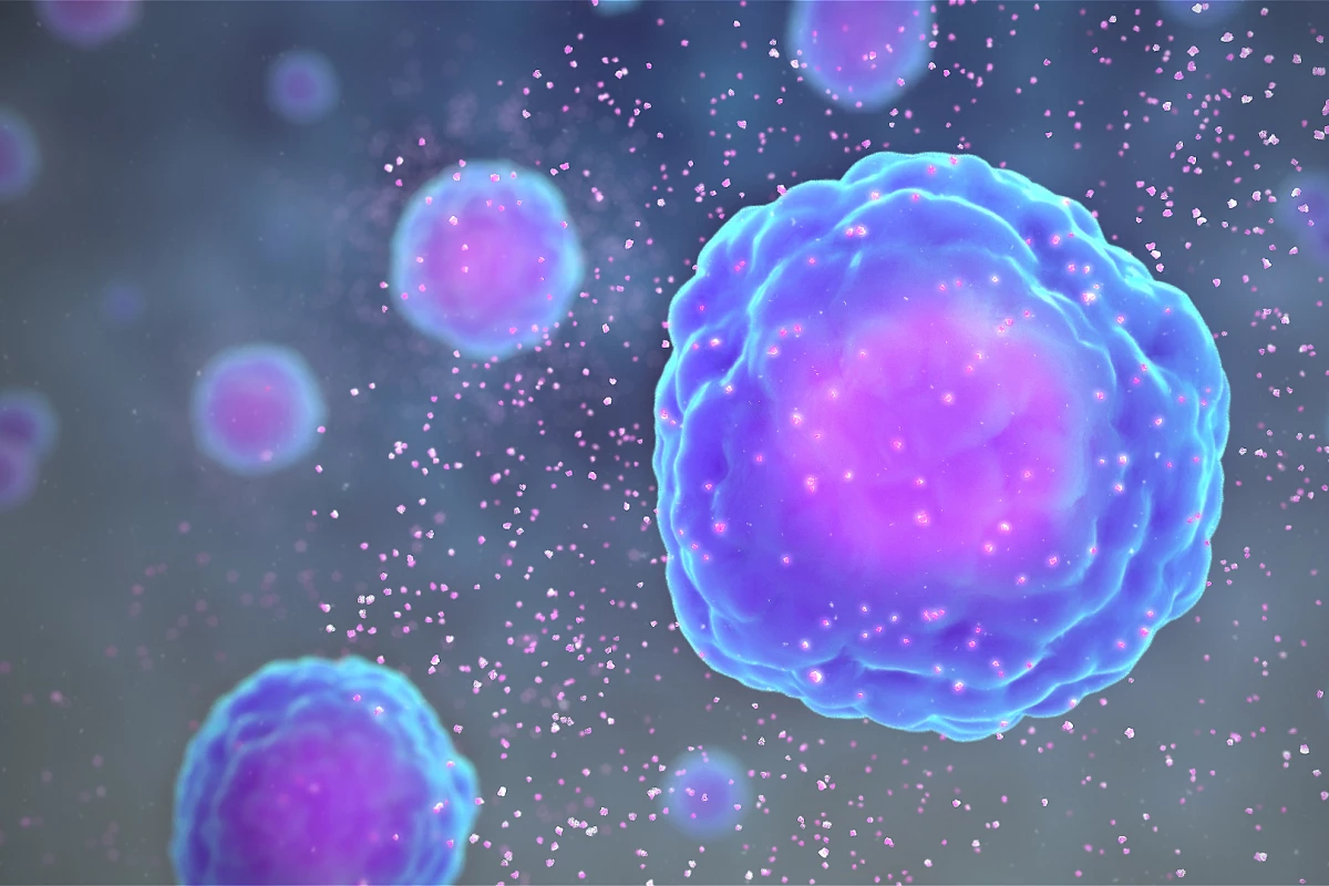 An illustrating of cells releasing cytokines (tiny pink dots), which are inflammatory immune cells that can