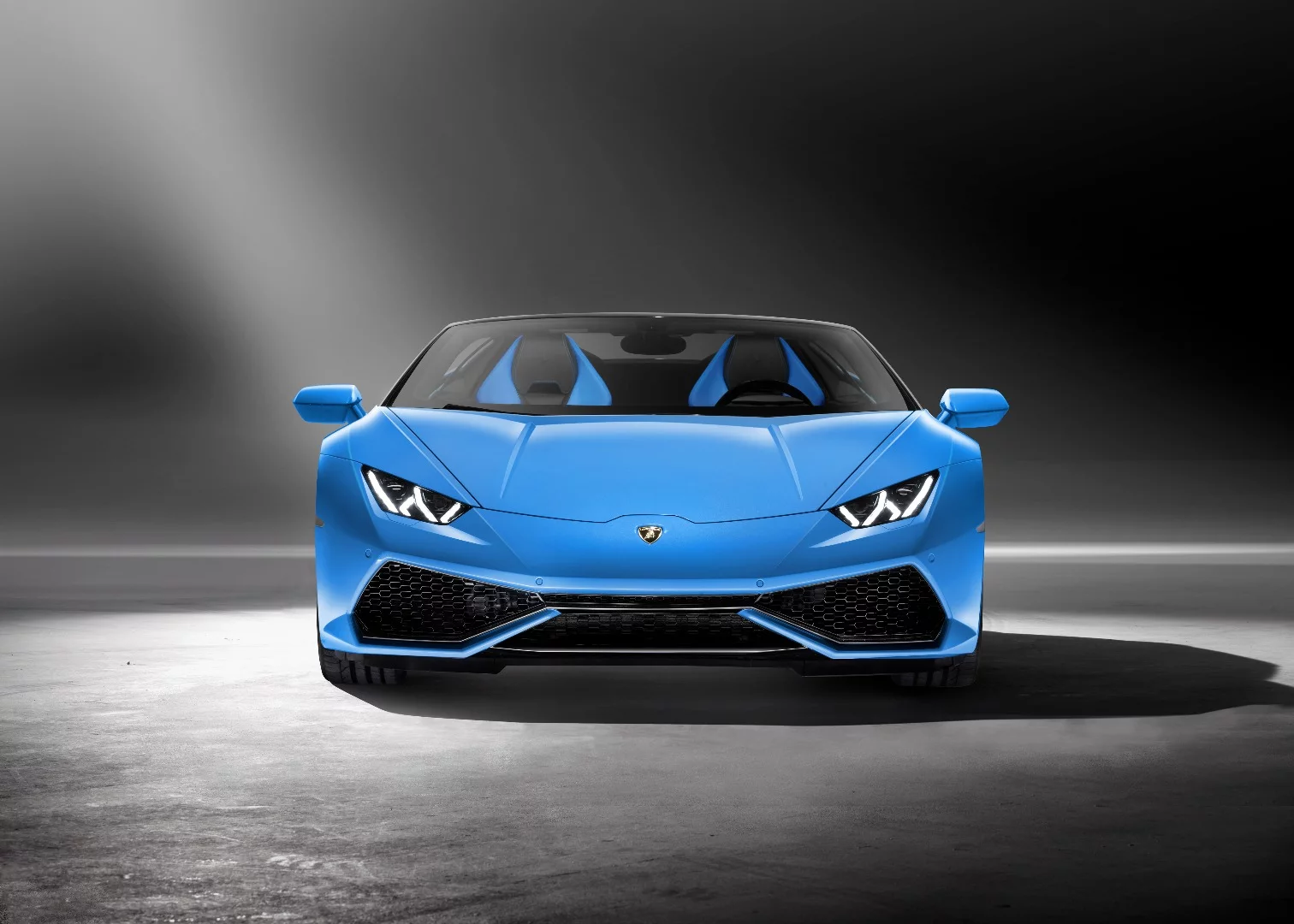The Huracán's V10 engine remains naturally aspirated amid the spread of turbocharged rivals
