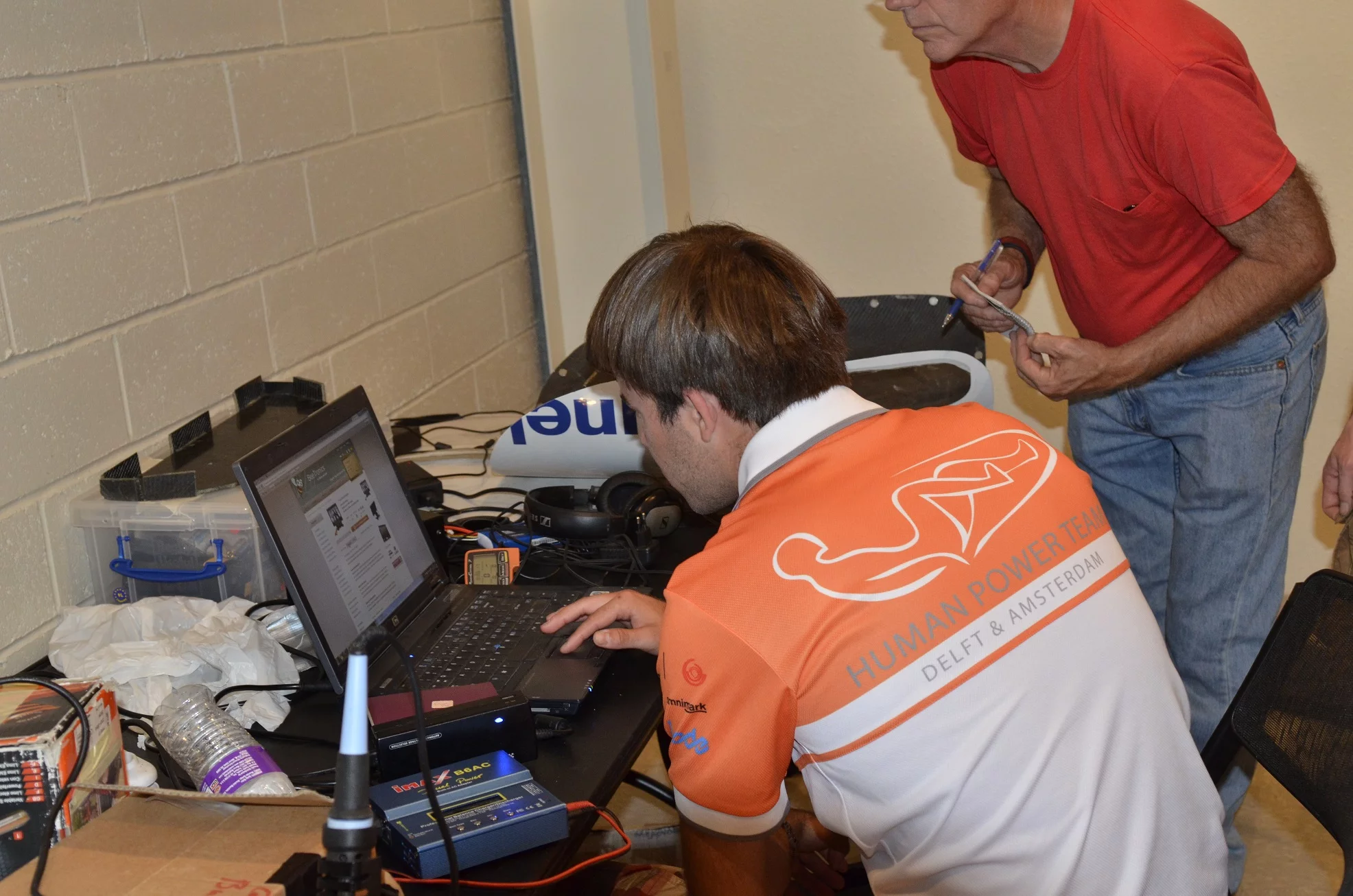 The Delft and Amsterdam team takes a moment out to browse computer monitors online (Photo: Rick Robson)
