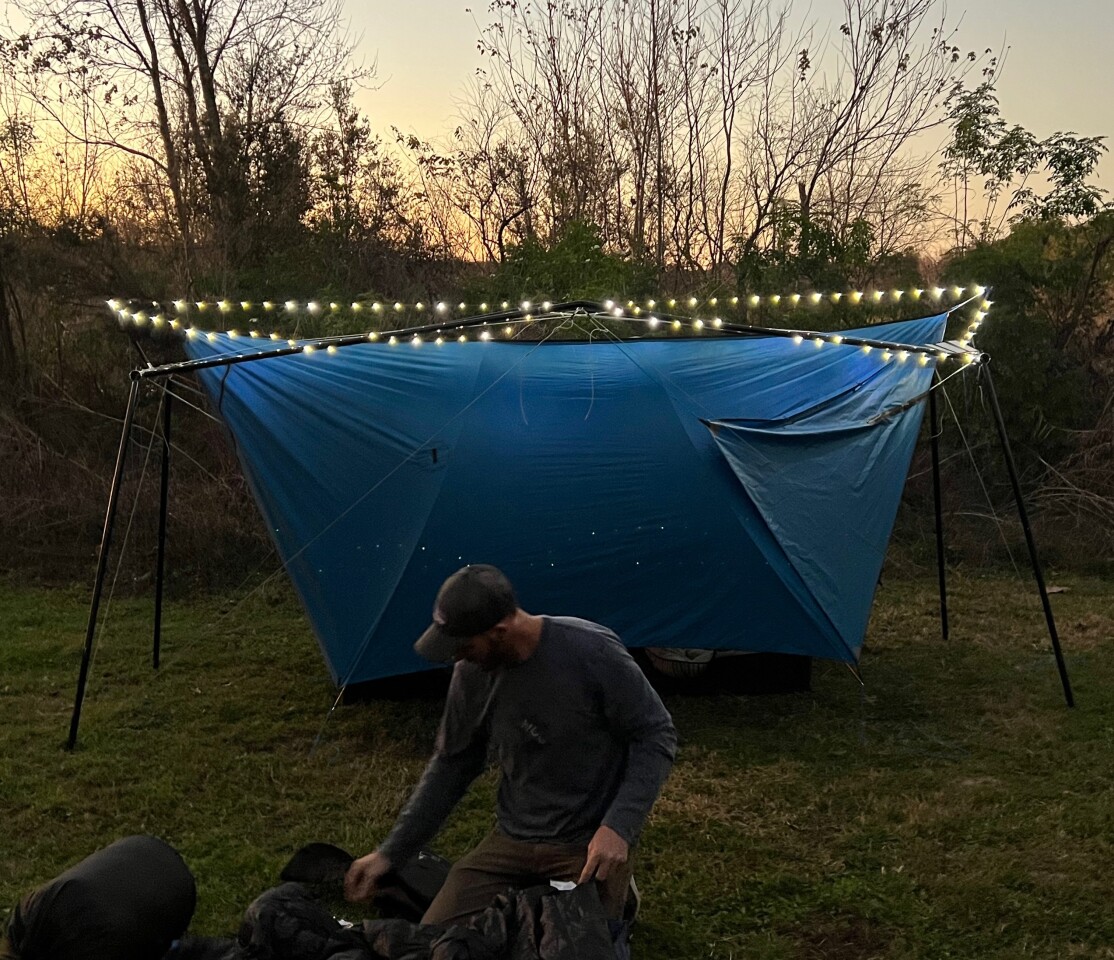 Tarp can be placed above or below the top of the hive