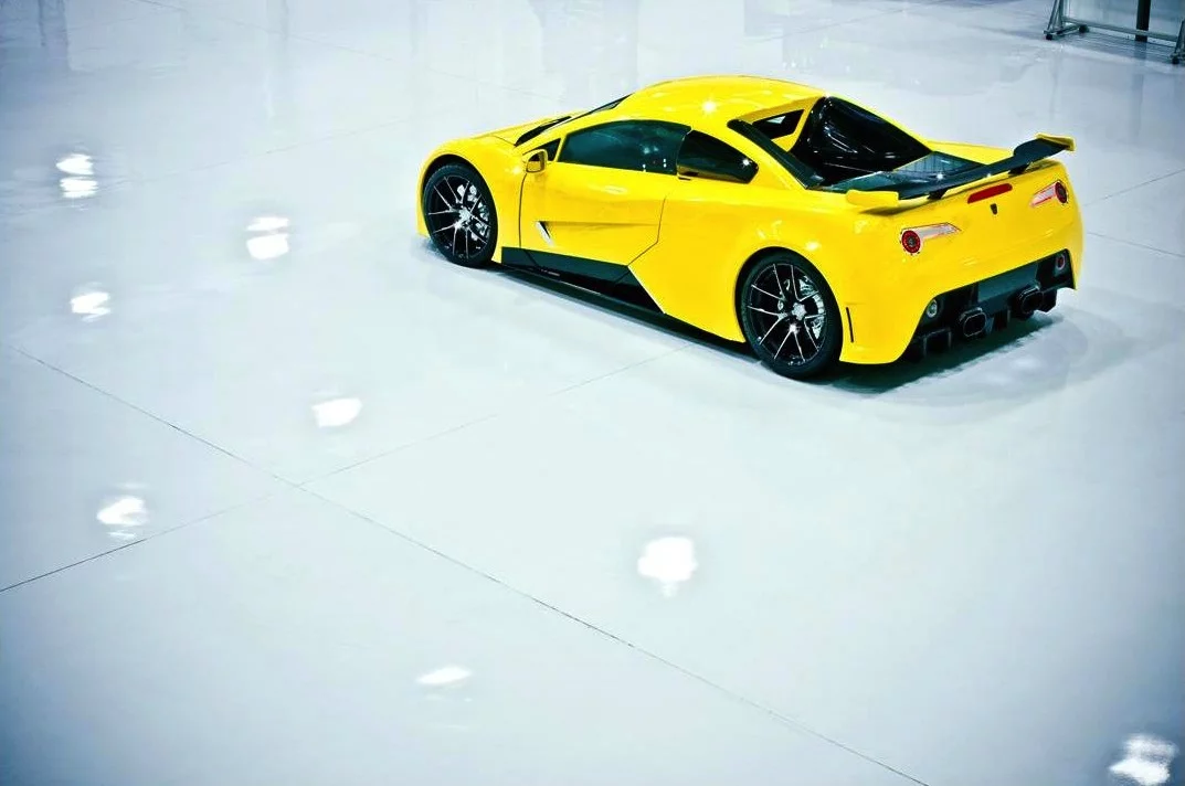 The AF8's aerodynamic package includes a rear spoiler, rear diffuser and front spoiler