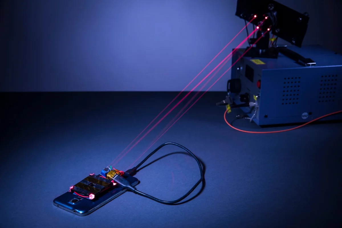 A new laser system can wirelessly recharge phones from across the room