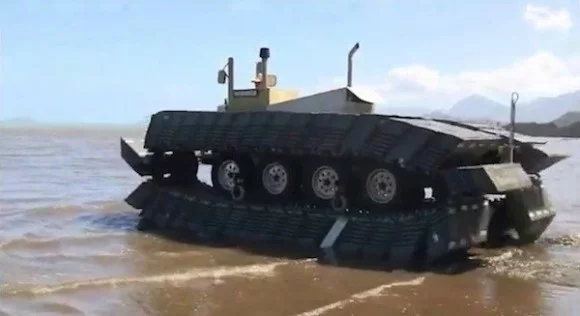 DARPA's one-fifth scale prototype of the Captive Air Amphibious Transporter - walks on land, marsh, and water (Photo: DARPA)