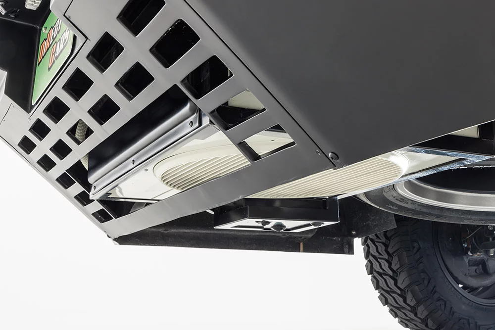 The outside A/C hardware gets housed below the body