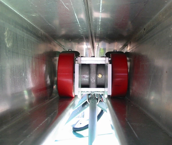 The demo model's bogie features two 1-watt electric motors and sits inside the overhead rail track