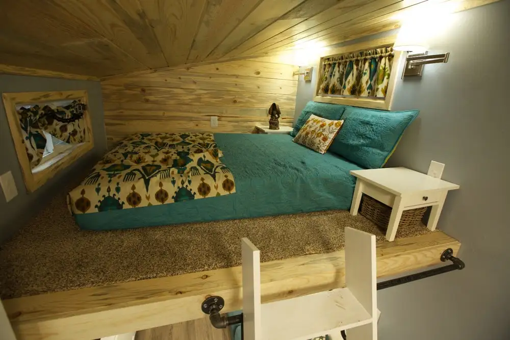 The parents' sleeping quarters is located in a loft above the Brown Bear's lounge area