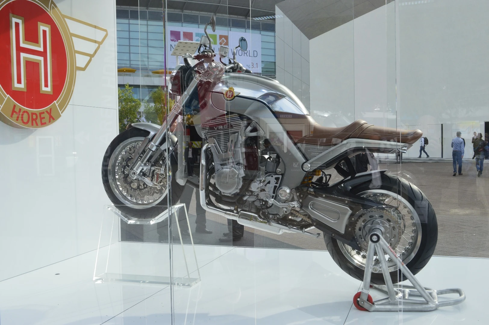 A Horex VR6 Silver Edition hovers next to the entrance
