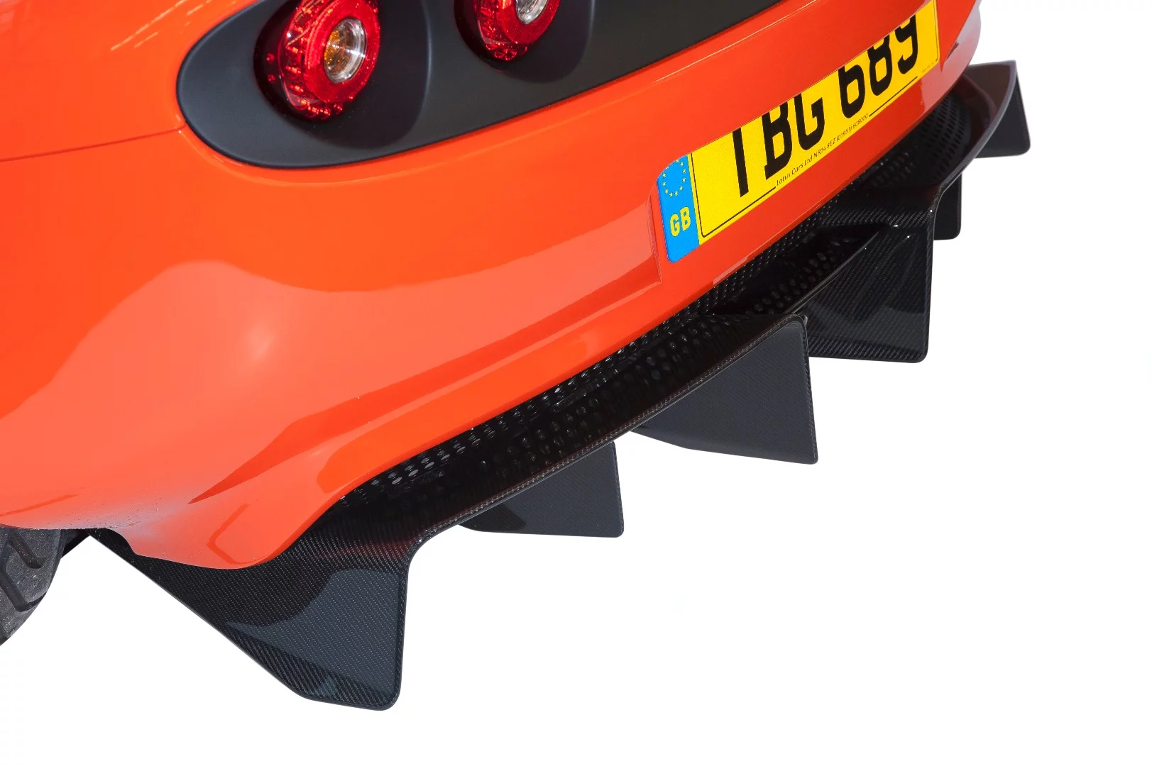 These rear diffusers on the Lotus Elise Cup 250 can be upgraded to carbon fiber