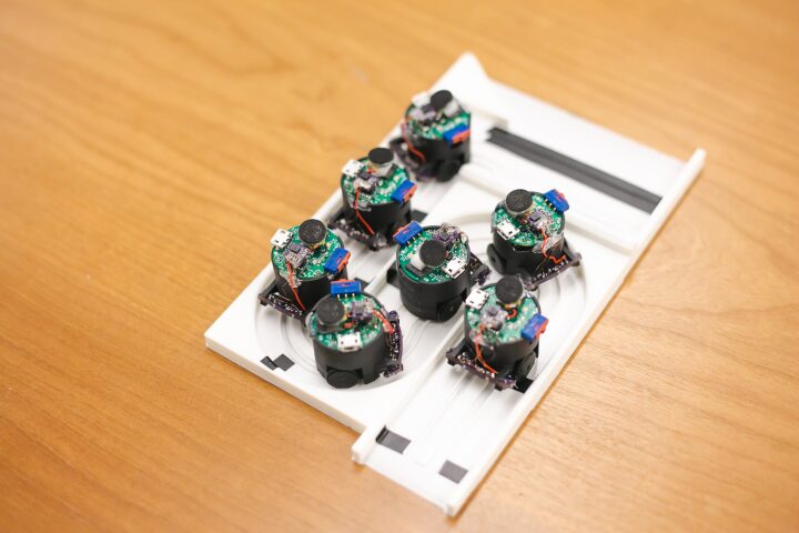 The UW team's seven-bot mic array on its charging station