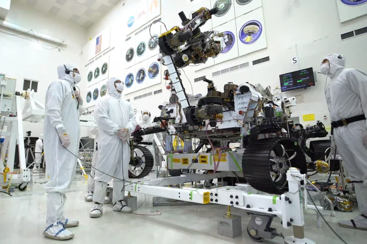 The rover's 7-ft-(2.1-m) arm maneuvers its 88-lb (40-kg) sensor-laden turret as it moves from a deployed to a stowed configuration