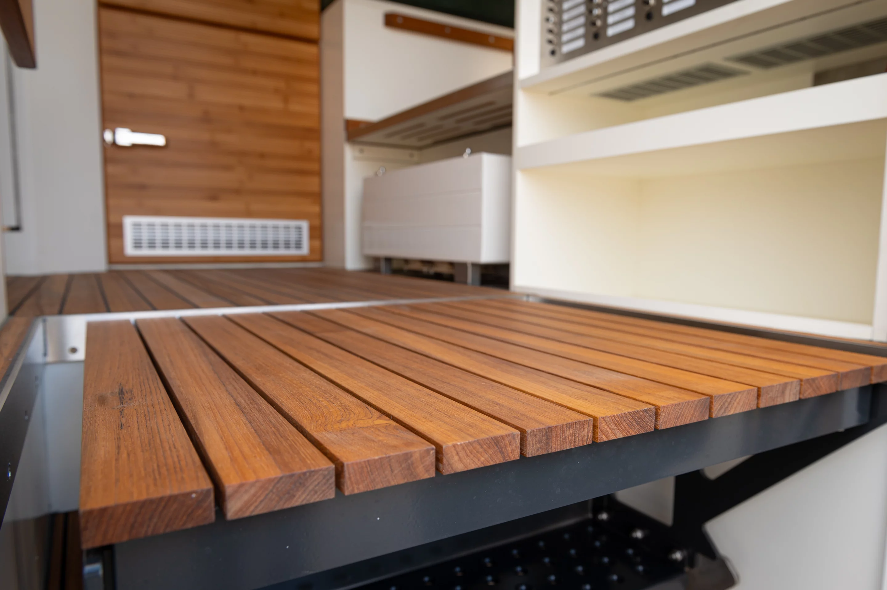 The MD56c has teak flooring and teak-veneered surfaces