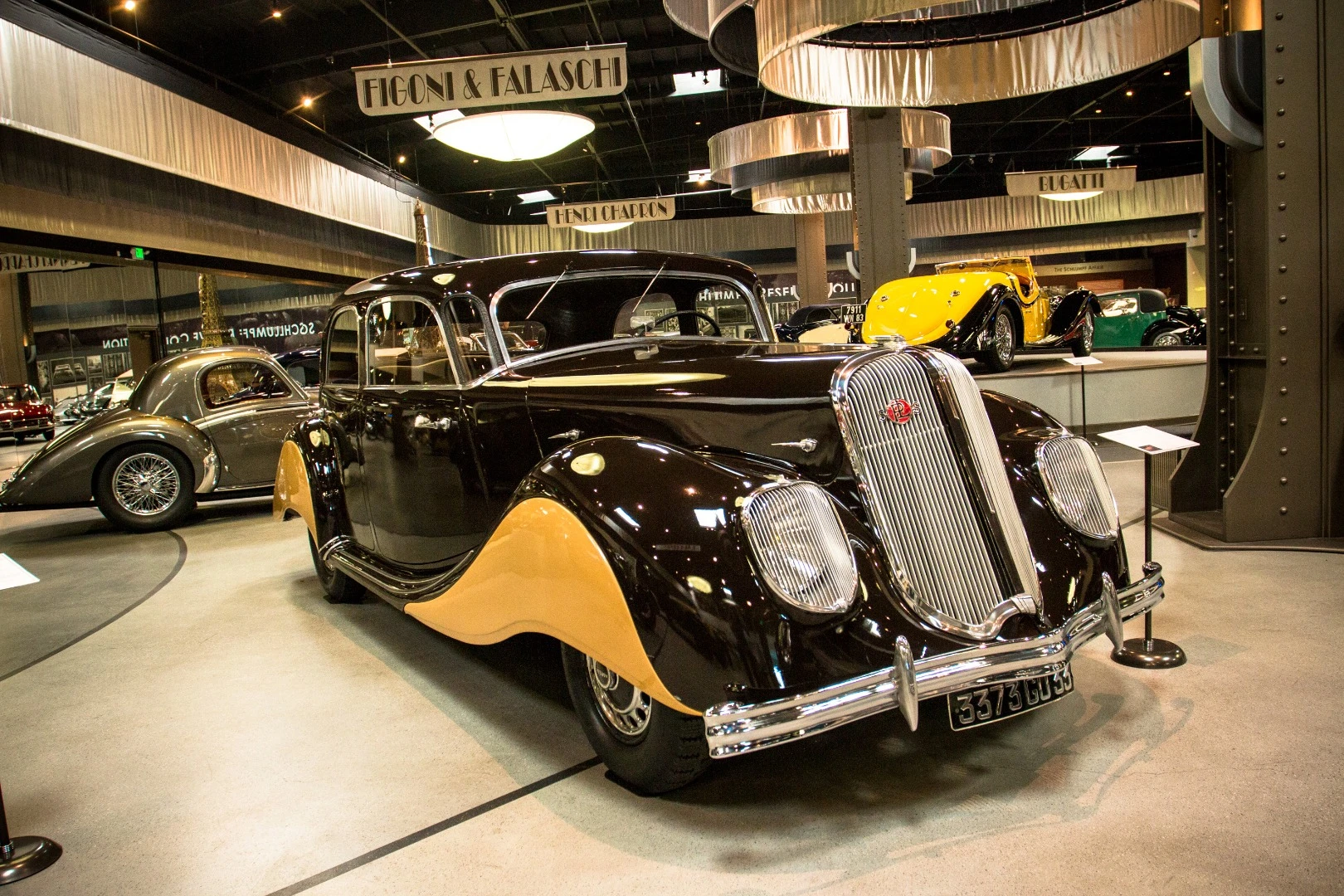 1939 Panhard et Lavassor X81 Dynamic Sedan: back before cars were required to pass modern safety tests, you could build them without giant A-pillars that block your view in corners. This Panhard uses double A-pillars with curved glass to fill in an important blind spot.