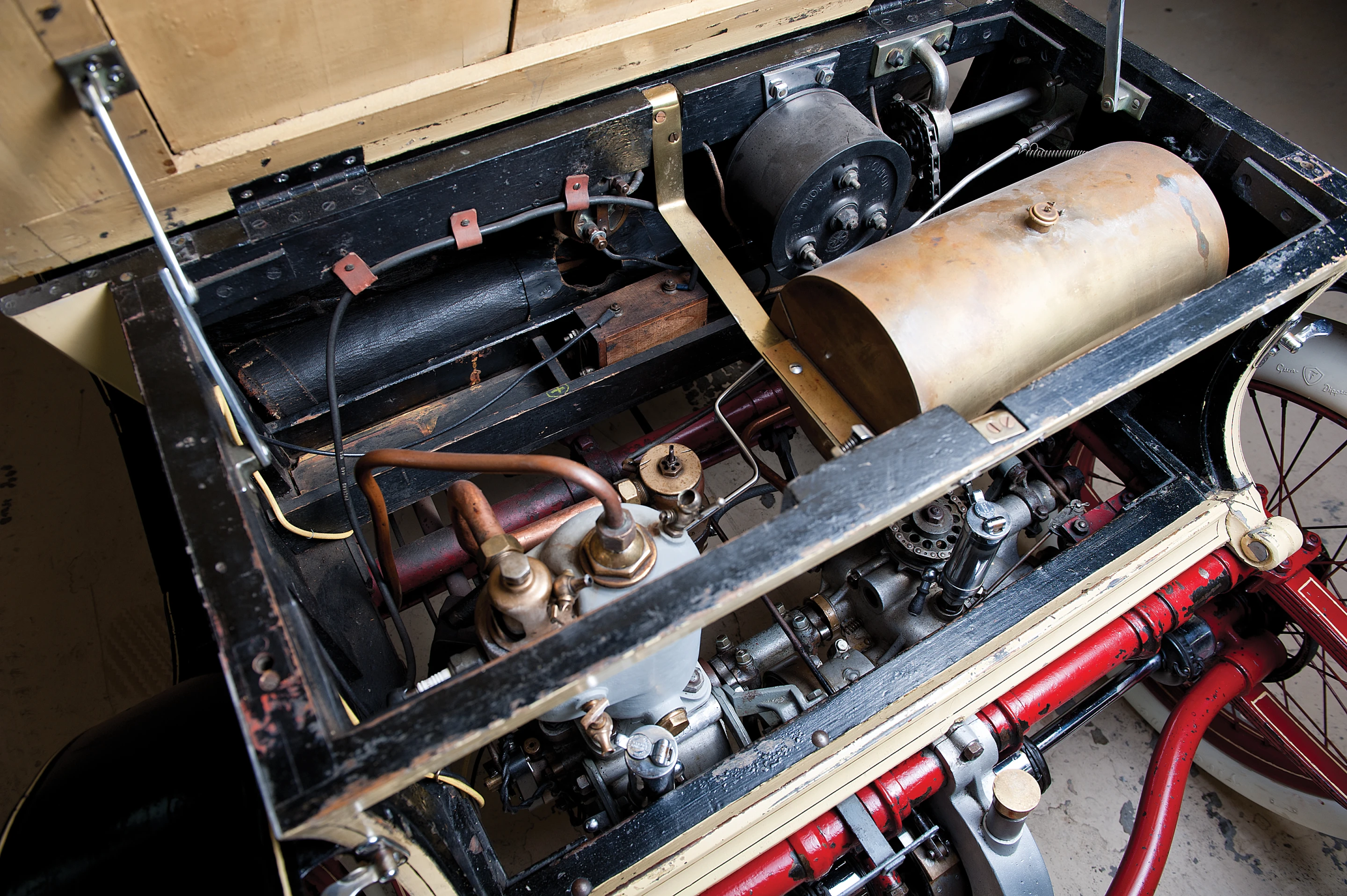 The De Dion-Bouton's 3.5 hp, 402 cc single-cylinder engine and two-speed transmission were rebuilt in 1992
