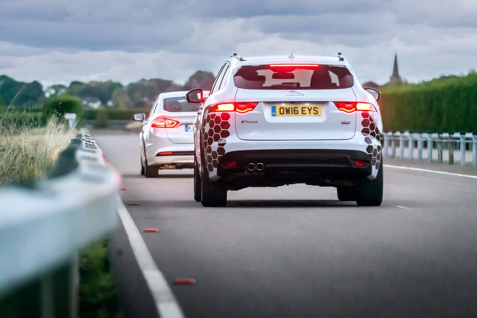As part of the UK Autodrive demonstration, a car was shown communicating to cars behind that it had braked severely, with the drivers in the following cars alerted accordingly