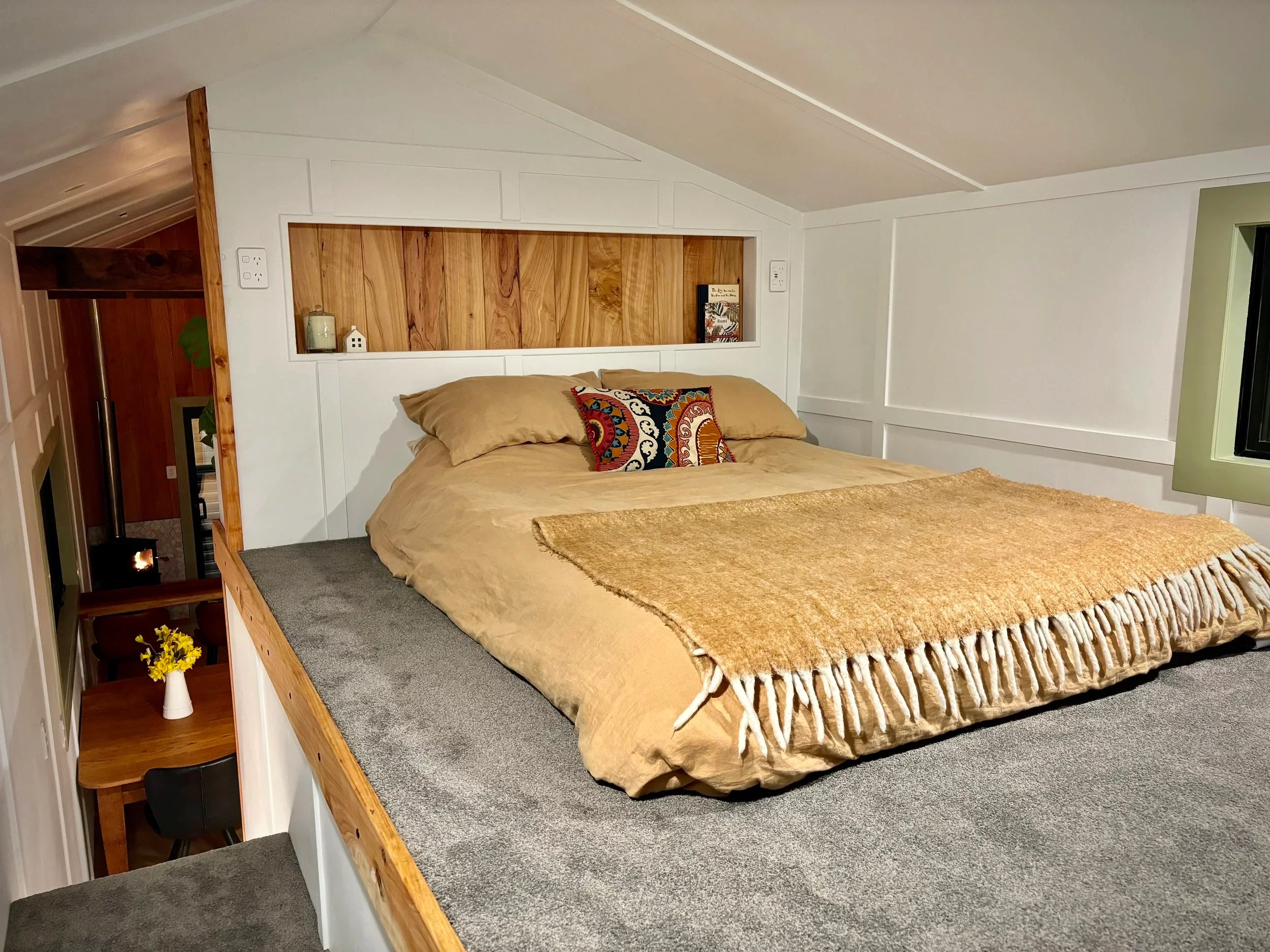 The Redwood's loft bedroom includes a lowered standing platform to make it easier to get dressed