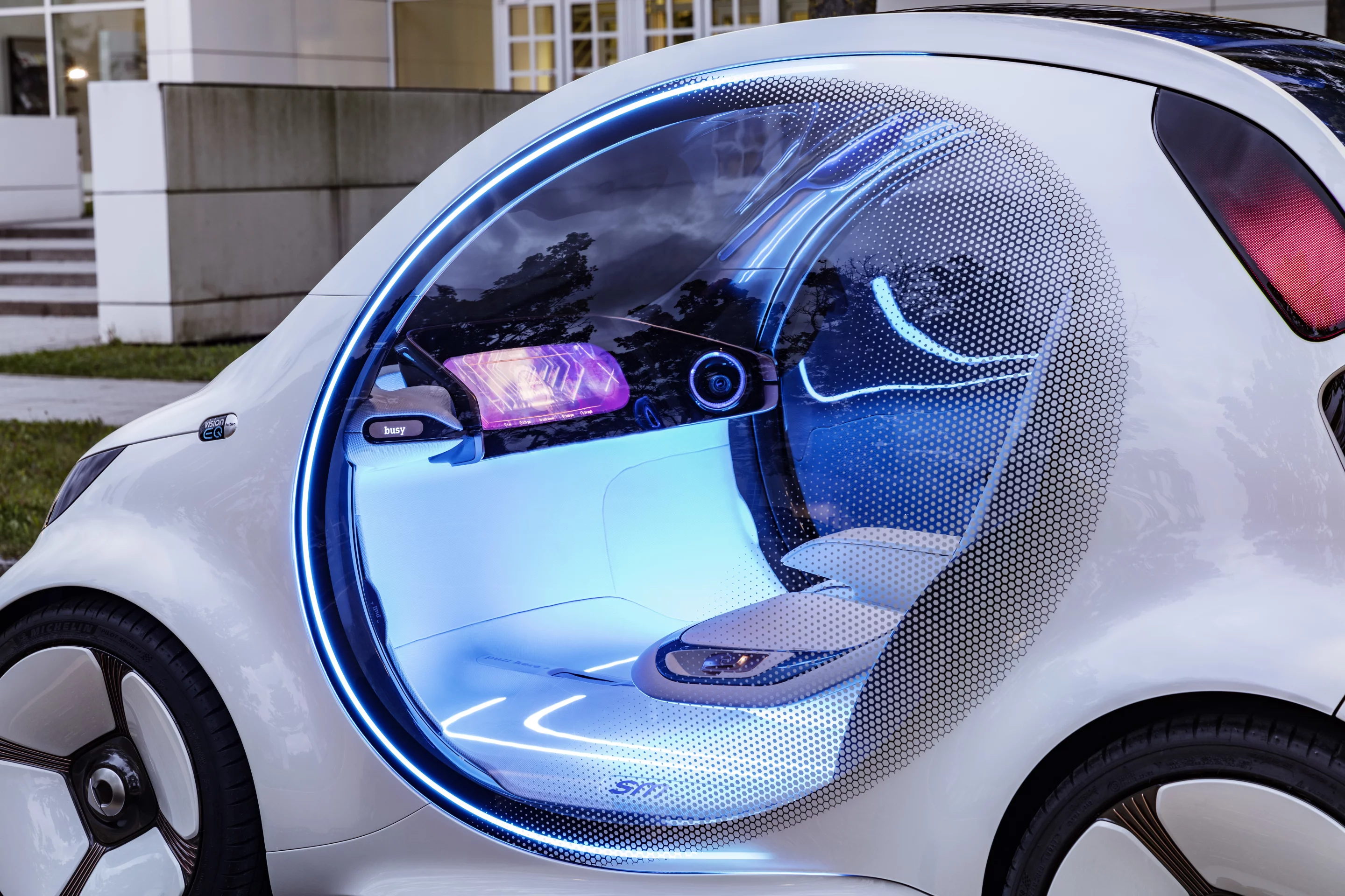 A 24-in front central display stands in for the dashboard