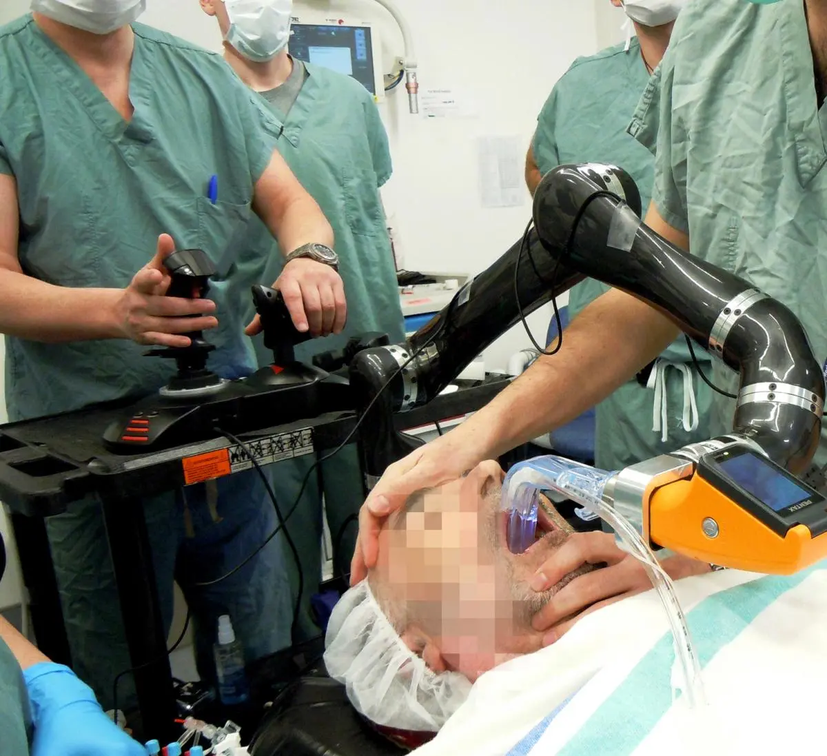 A robotic intubation system that inserts endotracheal tubes in patients is being tested on human subjects(Photos courtesy McGill University Health Centre)
