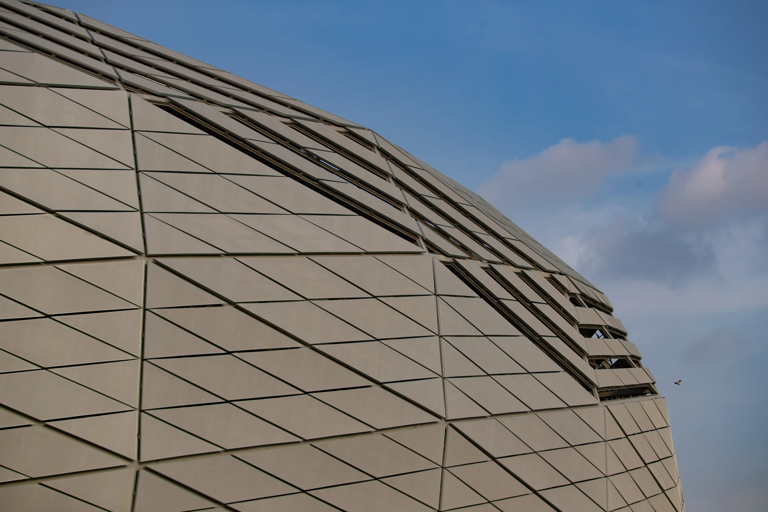 Education City Stadium's distinctive facade is likened to a shimmering diamond