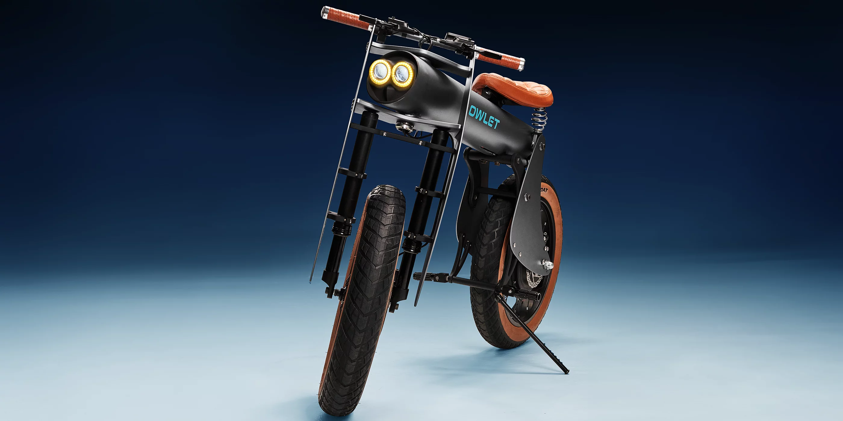 The front side panels mask a suspension fork with air dampening, while the top battery tube is fronted by "Angel Eyes"
