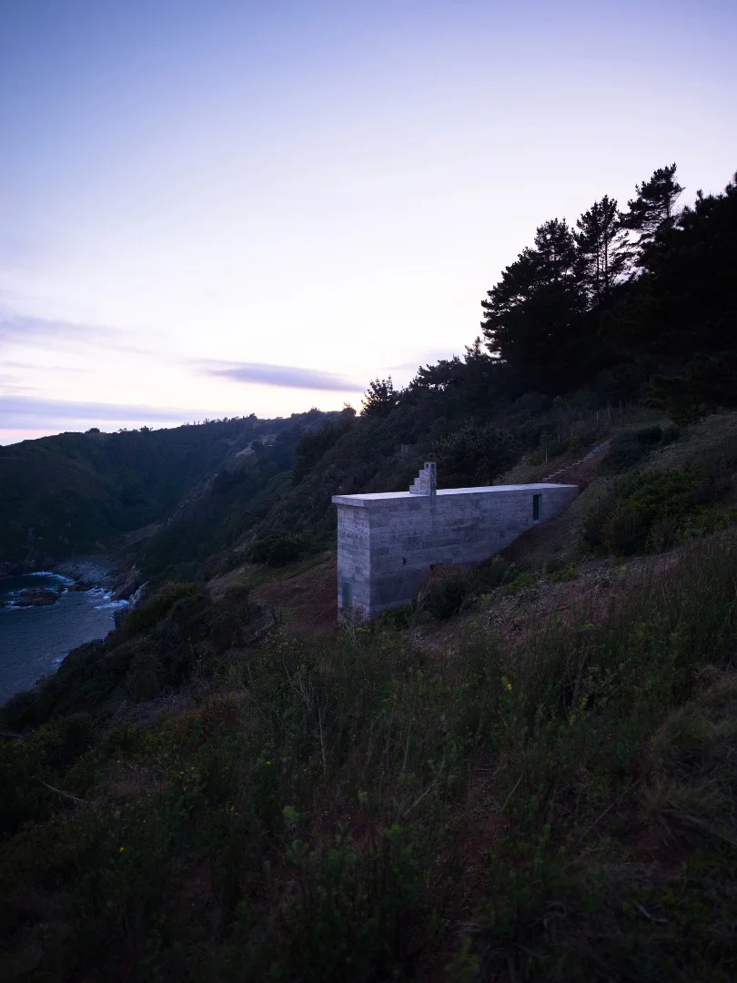 Loba House is narrow and looks a little like a concrete wall from a distance
