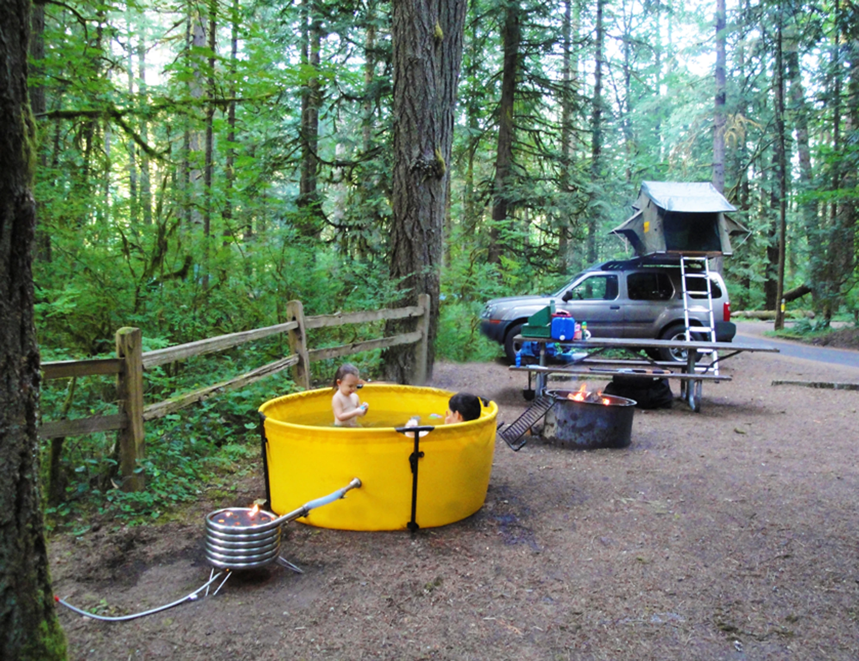 The Nomad Collapsible hot tub and frame will set you back US$550, not including the heater coil to make warm water