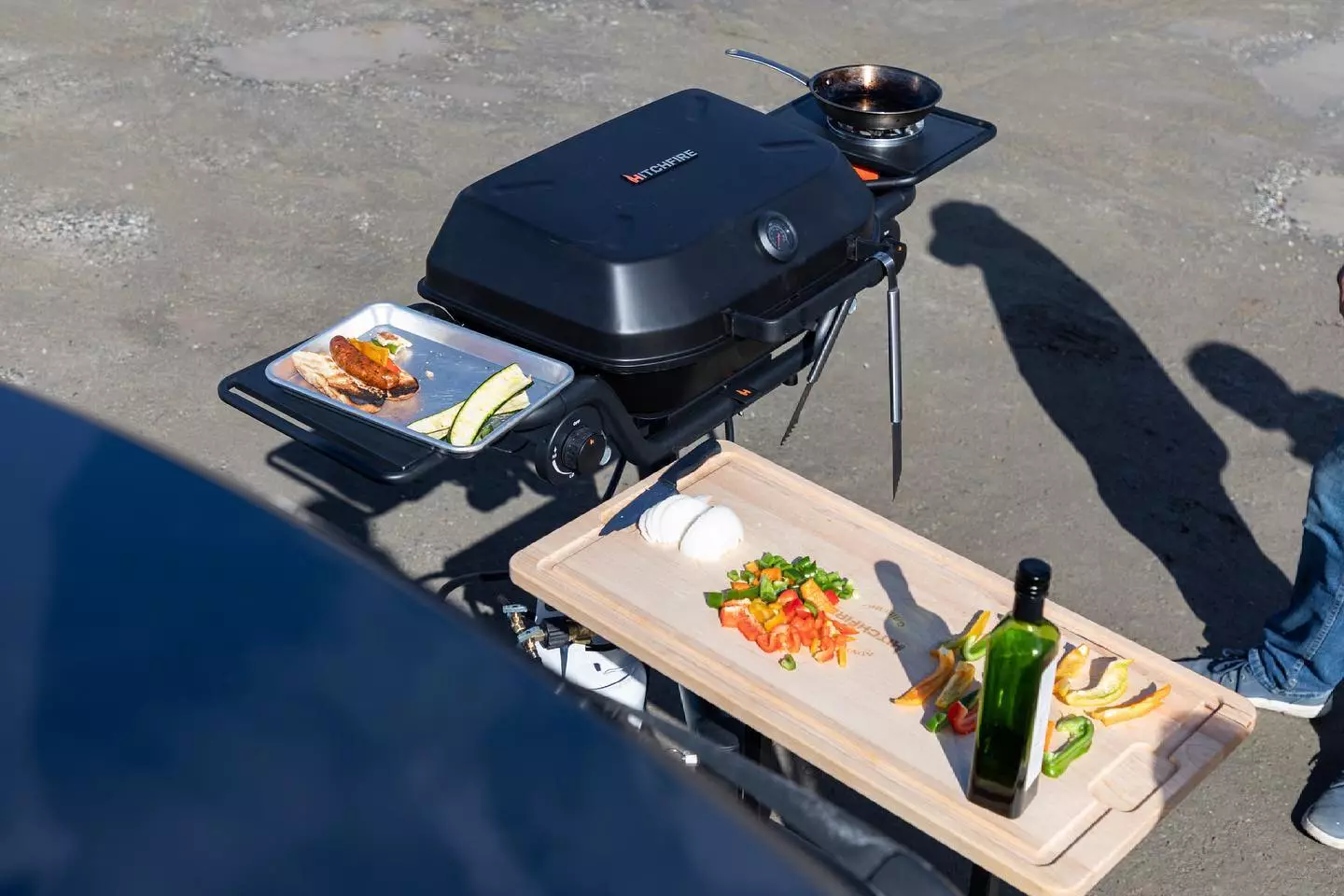 The new Ultimate Grill Station package makes something of an L-shaped kitchen out of the Forge 15 swing-out grill