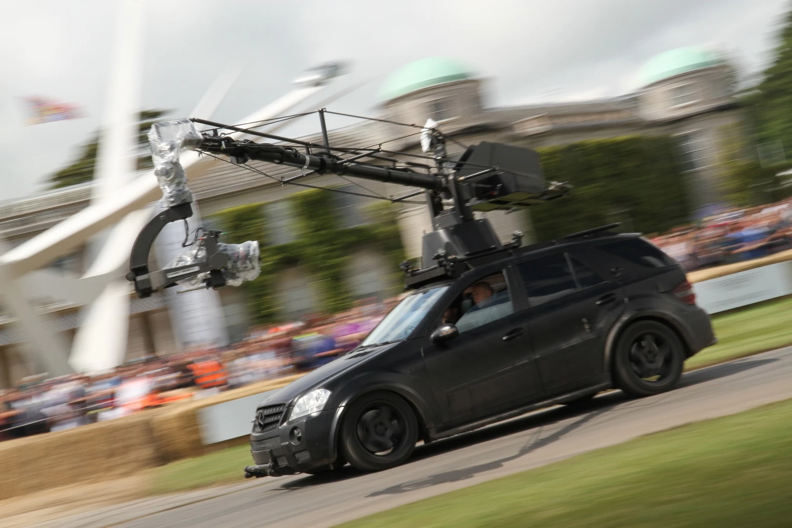 Even big-rig camera cars get a run at Goodwood. Either that, or this is an expensive driving selfie