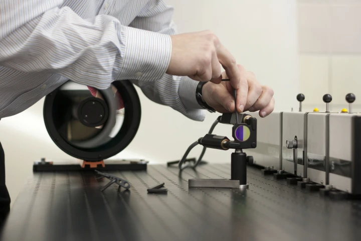 After the laser beam hits the sample, the scattered light is collected by a telescope and the sample analyzed
