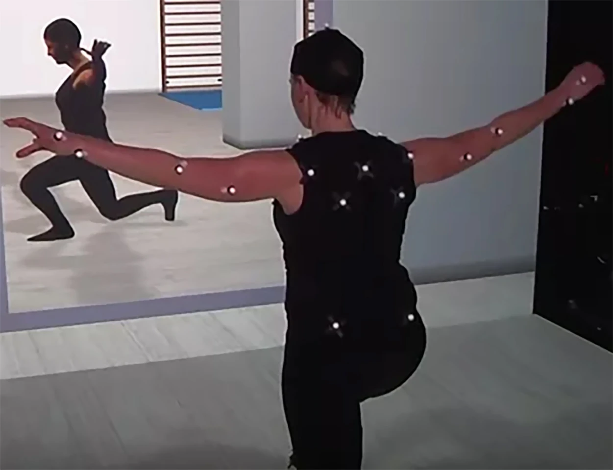 The user of the ICSPACE wears a series of sensors to convey their body movement in the virtual space